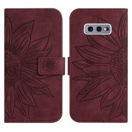 ART SUN FLOWER Peněženkové pouzdro s řemínkem Samsung Galaxy S10e bordó